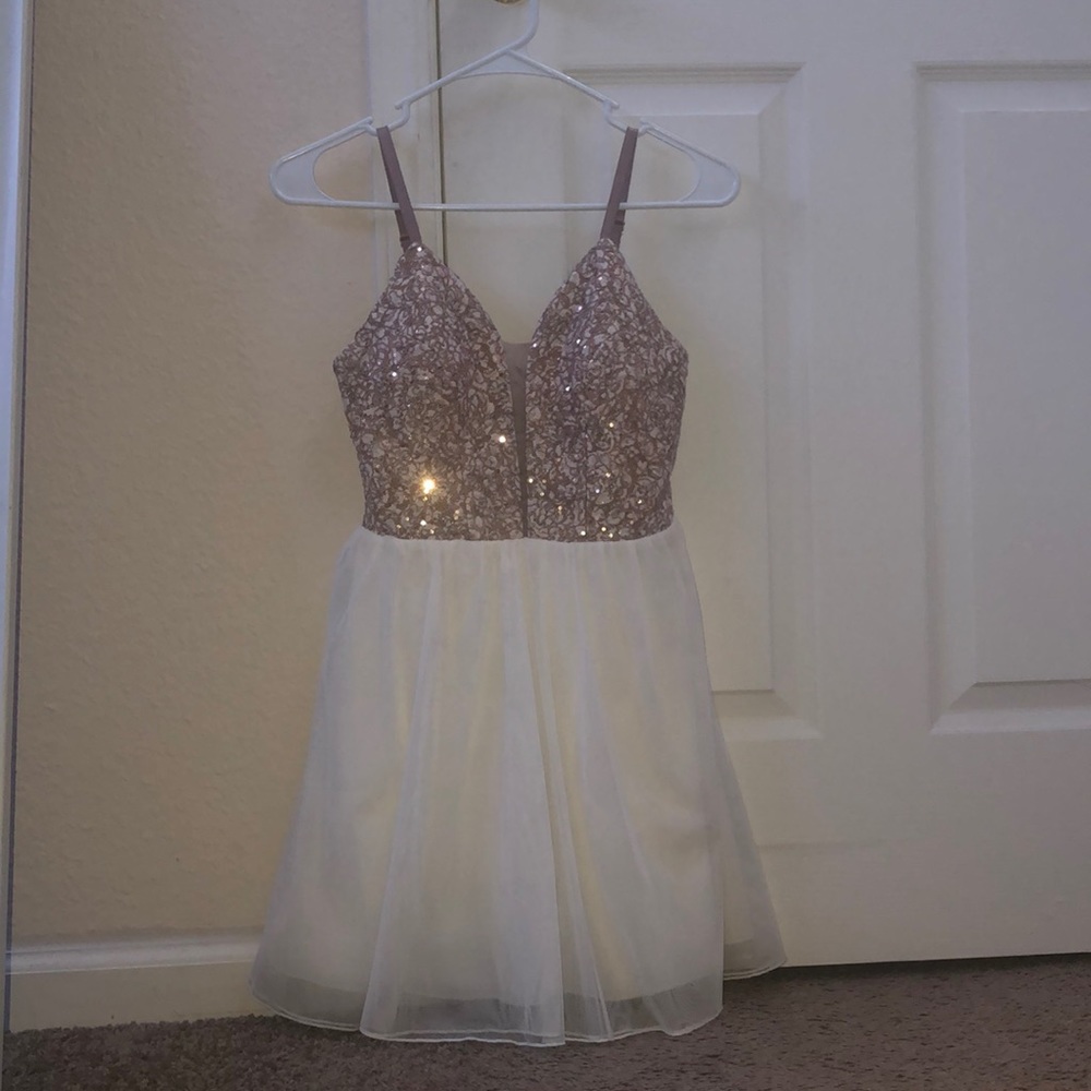gold and white dress, worn once! great condition.